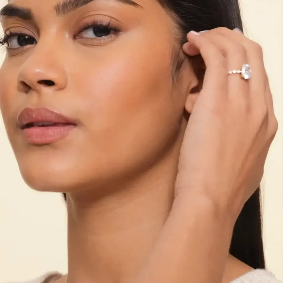 model wearing two rows of diamonds hoop earrings yellow