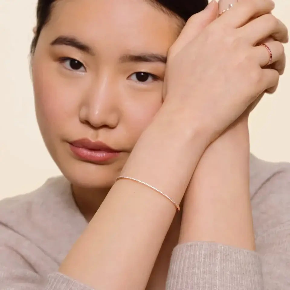 2nd model wearing yellow gold Zoey Diamond Bangle Bracelet