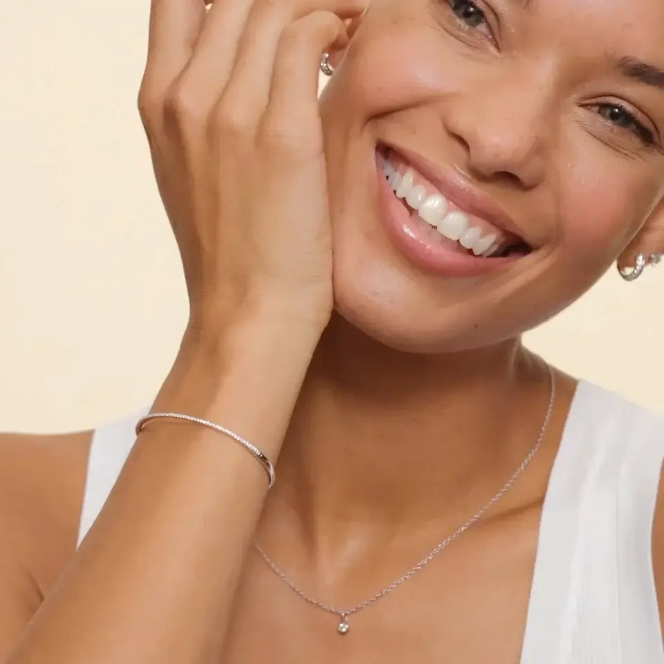 model wearing white gold Zoey Diamond Bangle Bracelet