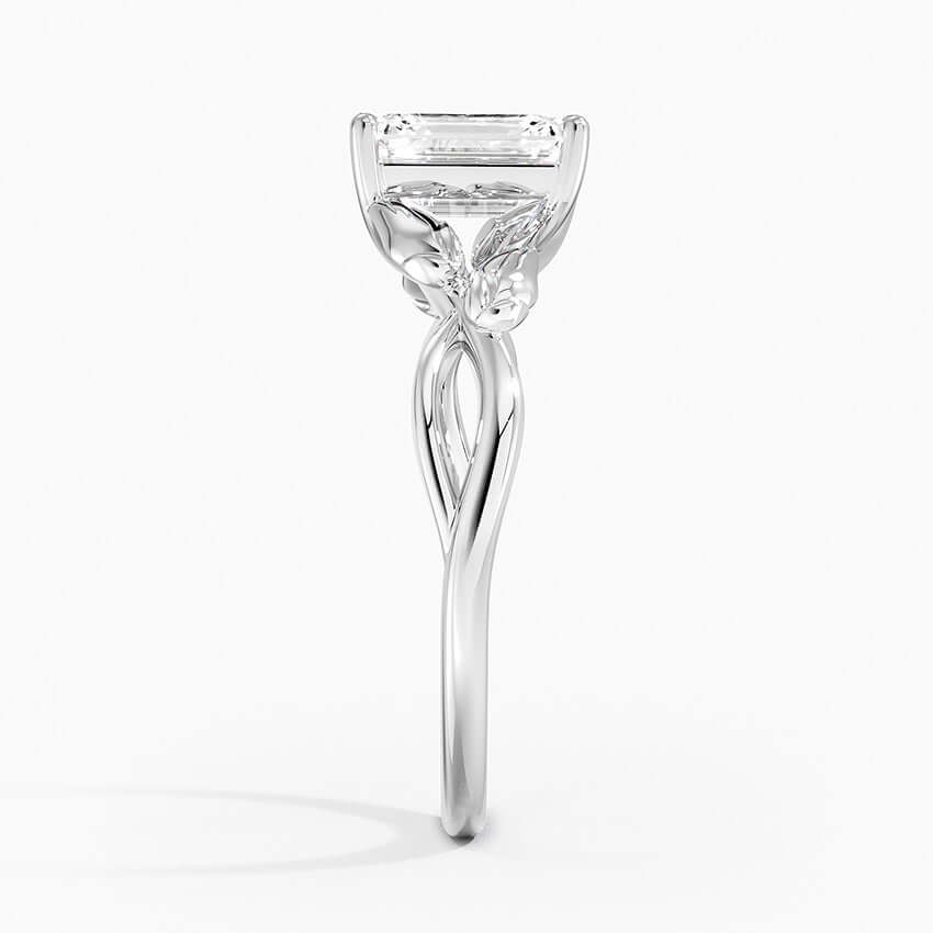 incredible unique emerald cut diamond engagement ring white gold side view