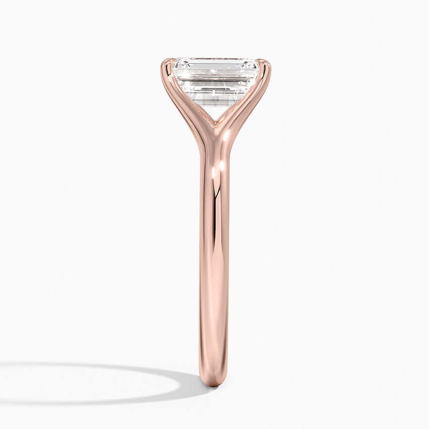 emerald cut clean engagement ring rose gold side view