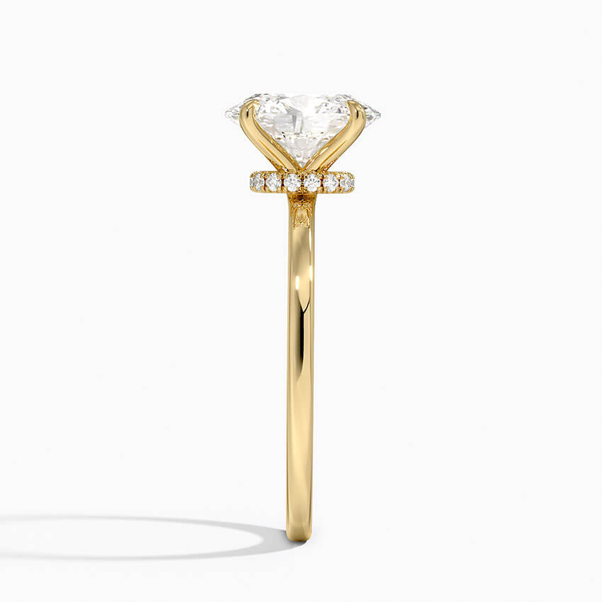 Hidden halo oval cut lab diamond claw prongs engagement ring yellow side