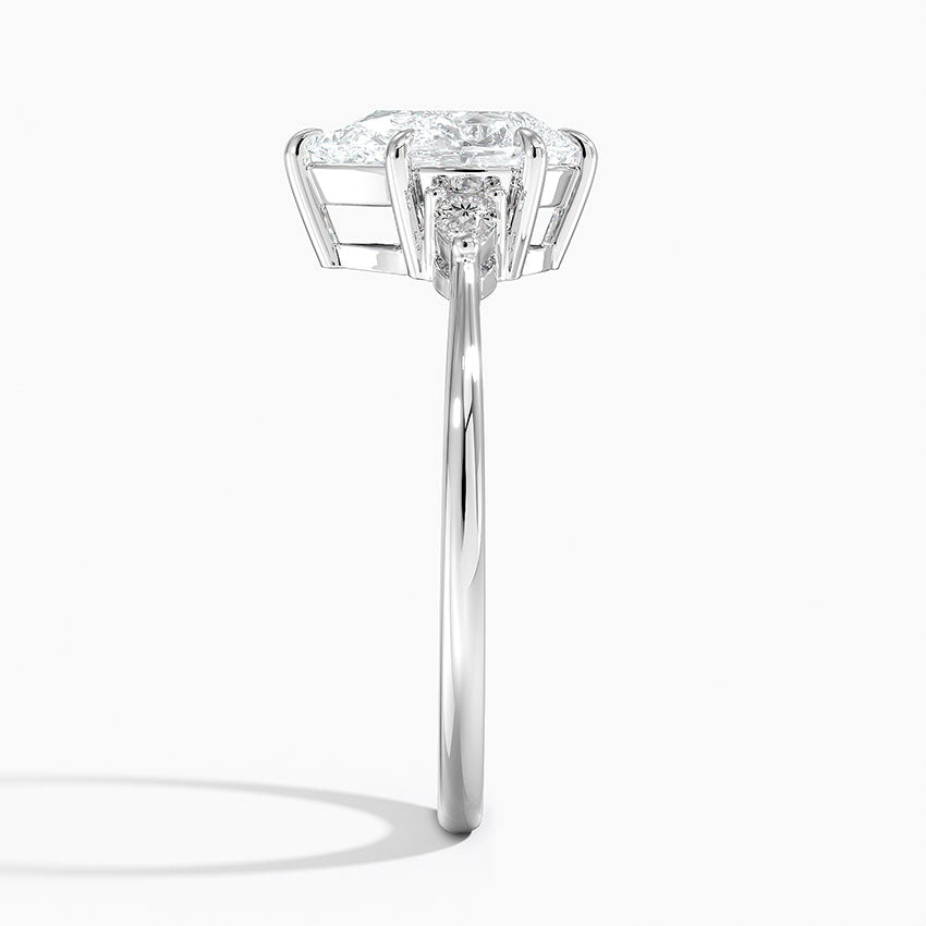 pear diamond three stone side view white gold
