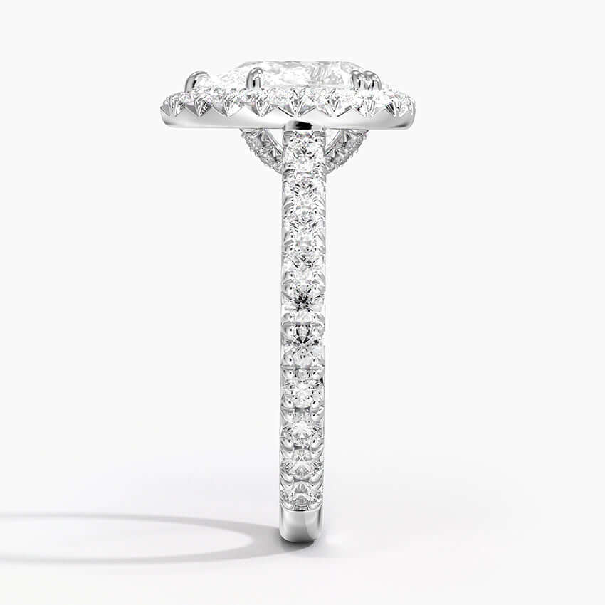lab diamond pear engagement ring halo setting claw prongs white side