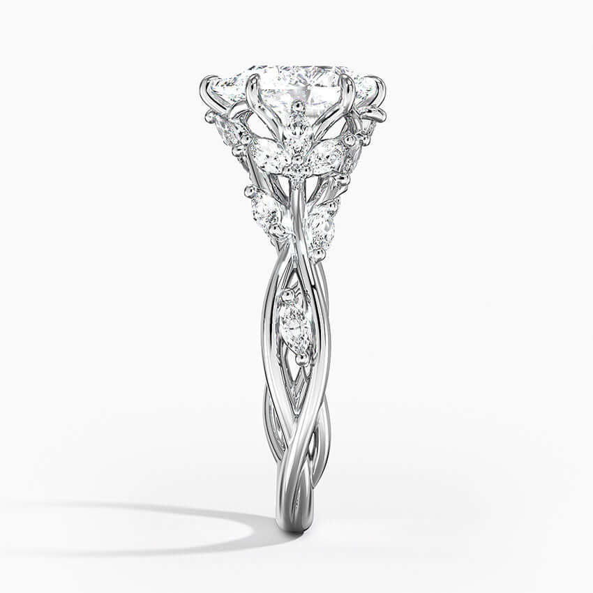 pear lab diamond set engagement ring with marquises on the sides claw setting white side