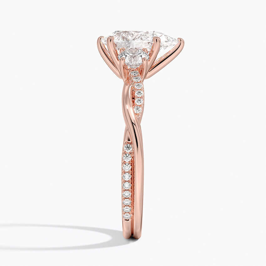 entwined pear lab diamond engagement ring threestone-like with pave setting rose side