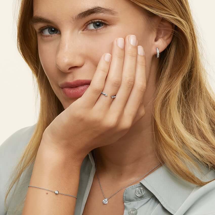 female model wearing Diamond Bezel Bracelet