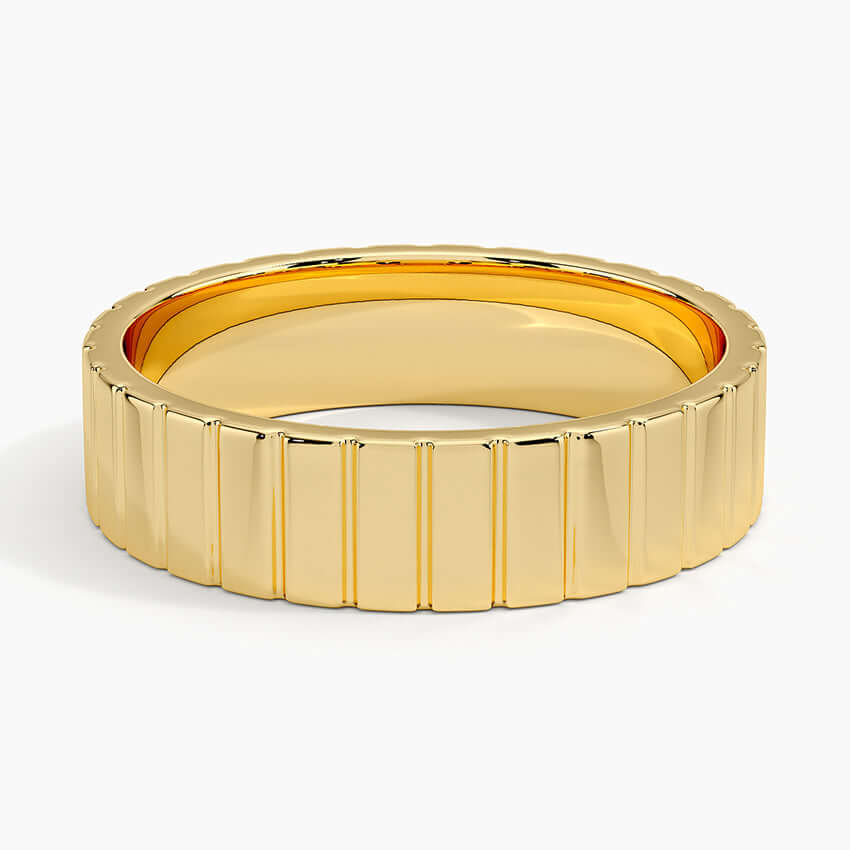 5.5mm wedding ring with deep engraving yellow gold face view