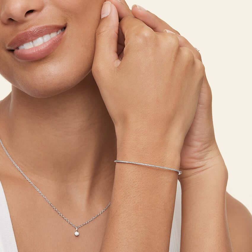 4yj model wearing white gold Zoey Diamond Bangle Bracelet