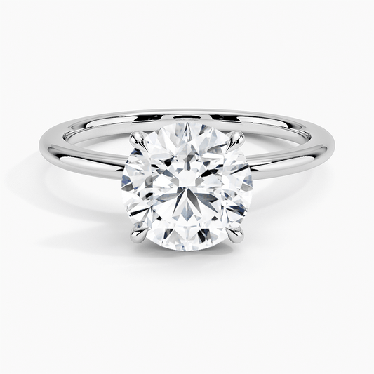 round claw set engagement ring white face
