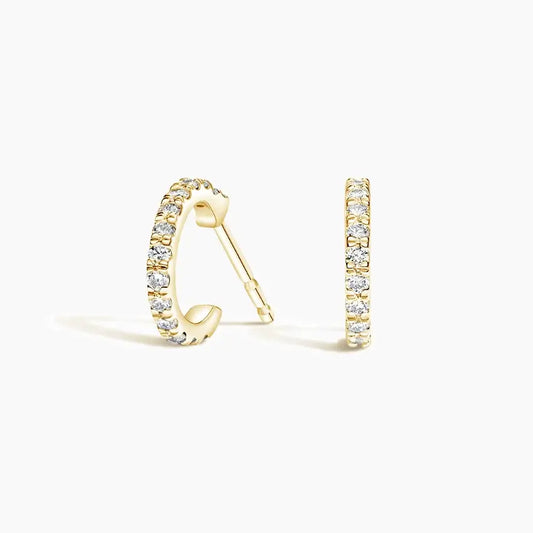 yellow gold diamond earrings with round diamonds pov1