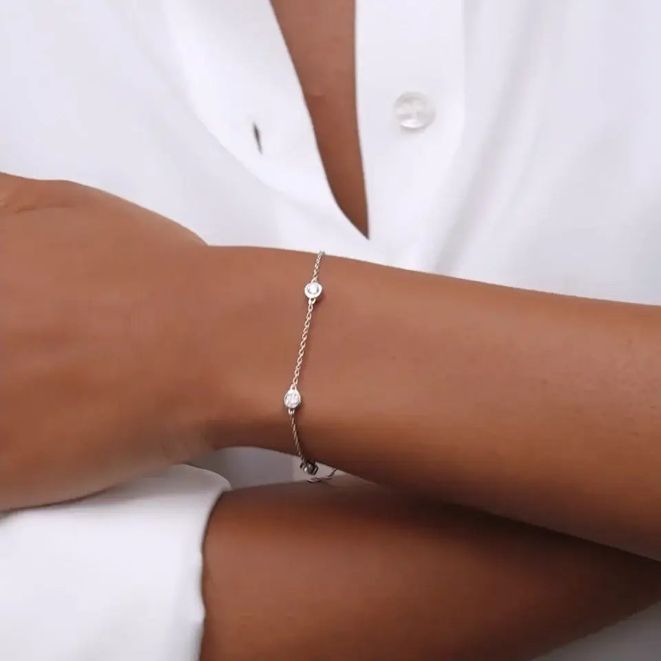 female model wearing Five Diamond Bezel Bracelet