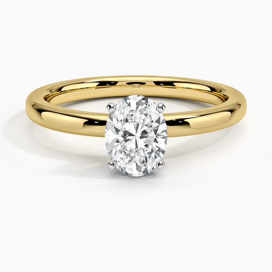 yellow and white gold engagement ring with oval diamond front view