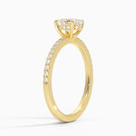 Claw prongs oval lab diamond engagement ring with pave settings and hidden halo yellow