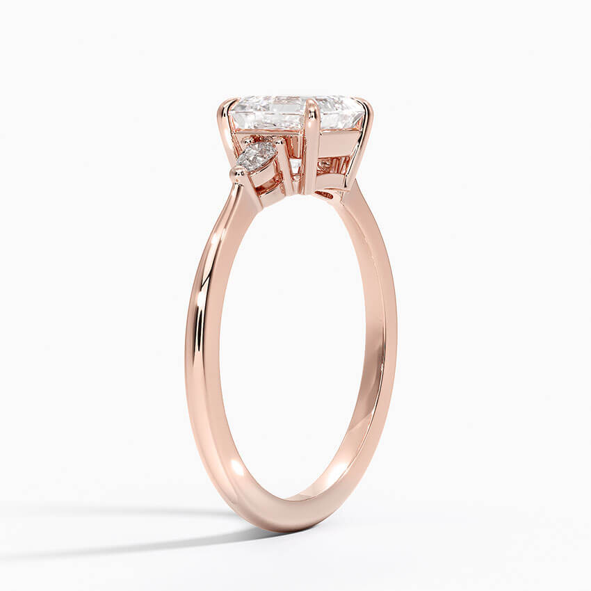 asscher cut diamond three stone engagement ring claw prongs rose gold