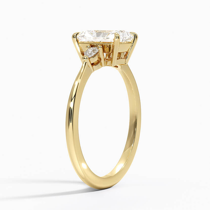 radiant diamond engagement ring three stone yellow gold 