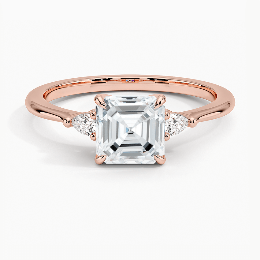 asscher cut diamond three stone engagement ring claw prongs rose gold face view