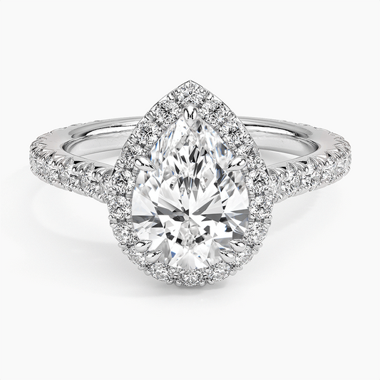 lab diamond pear engagement ring halo setting claw prongs white face