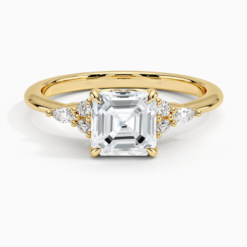 asscher cut lab diamond with round and marquise on sides face yellow