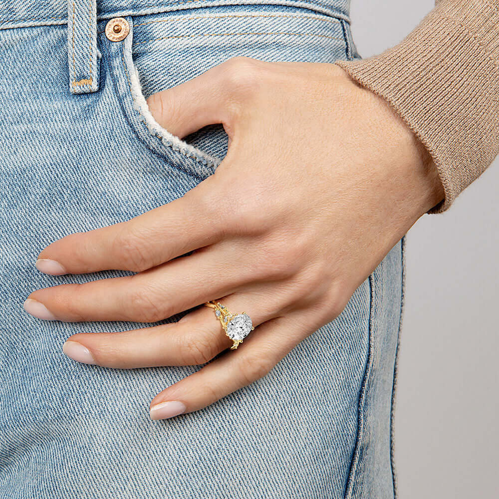 2nd model wearing nature inspired asscher cut lab diamond engagement ring with marquise diamonds yellow