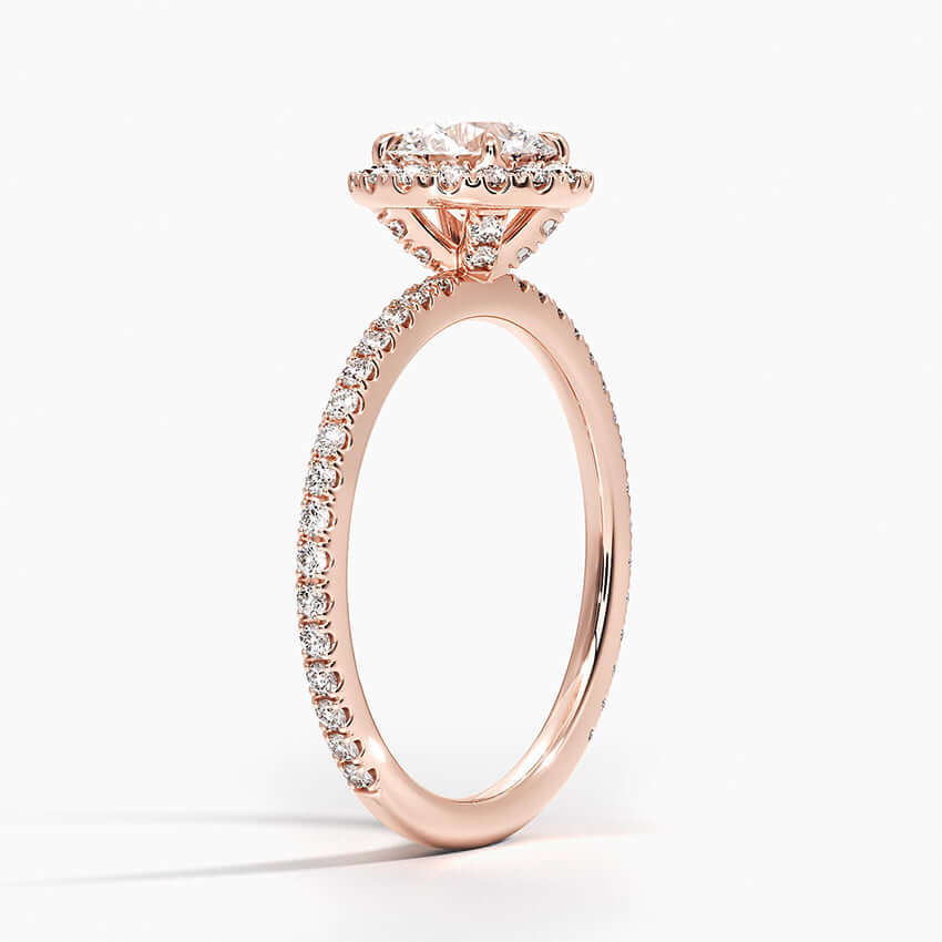 Round diamond halo engagement ring with diamond set bridge rose gold 