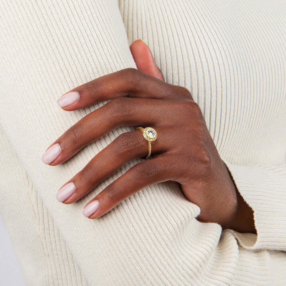 female model wearing Diane Halo Diamond Engagement Ring