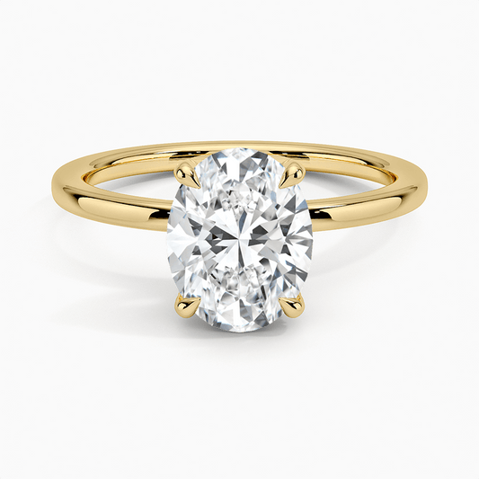 engagement ring oval diamond yellow gold with diamond set prongs face view