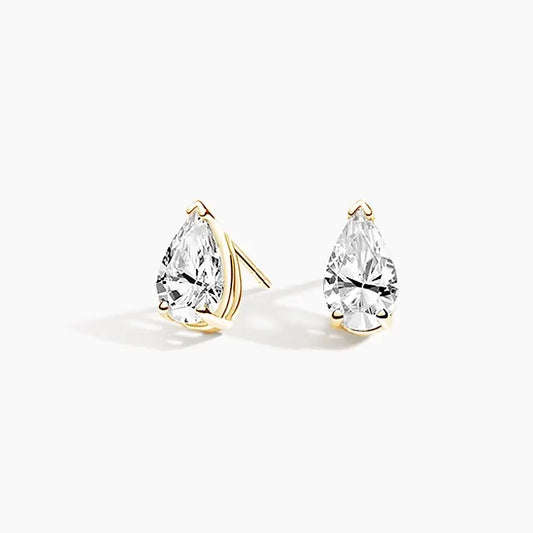 yellow gold pear cut diamond studs