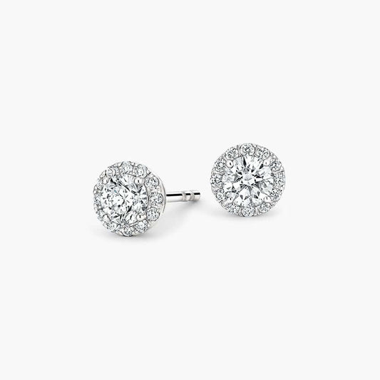 halo earrings with side and center diamonds 14k white gold