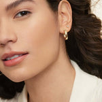 3rd model wearing hoop earrings