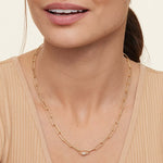 2nd model wearing paperclip diamond necklace