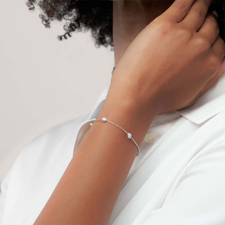 4th female model wearing Five Diamond Bezel Bracelet