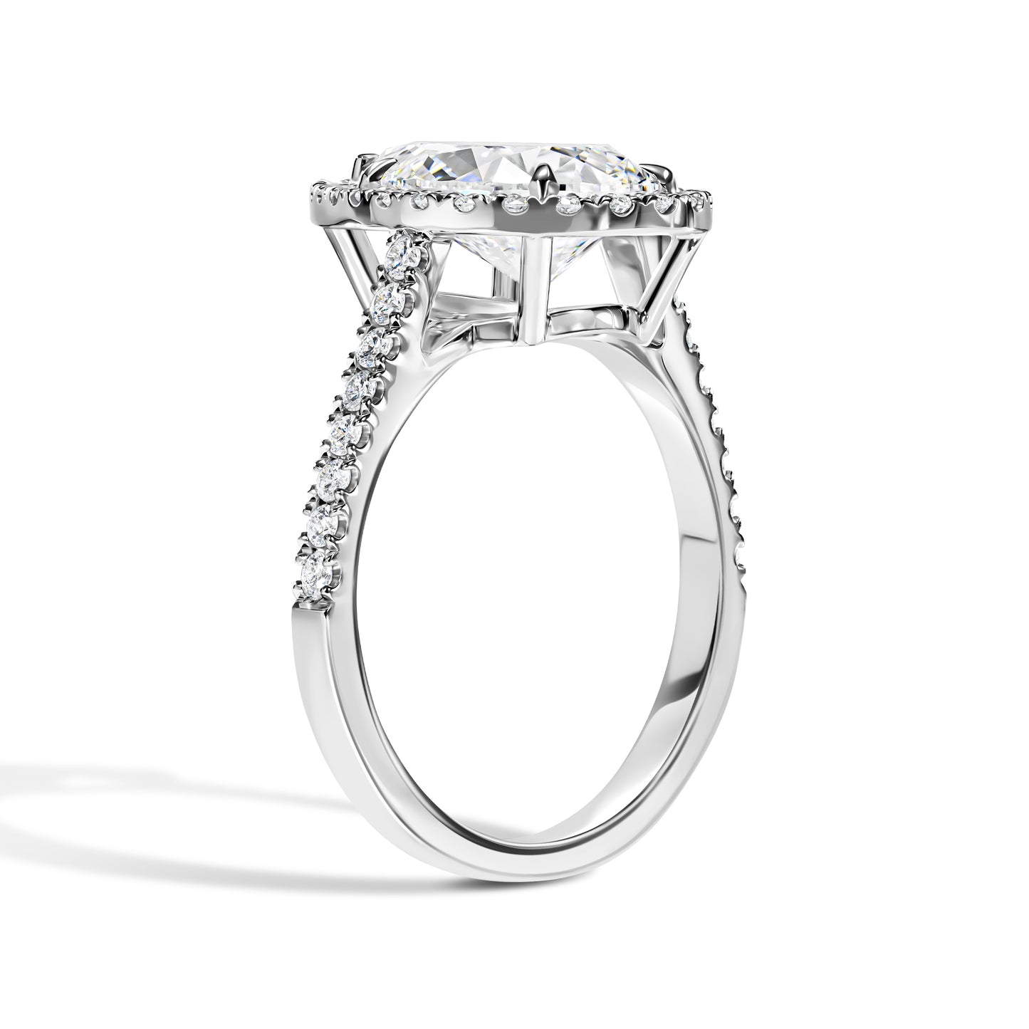 Diamond ring with a large central gemstone and smaller stones on a white background