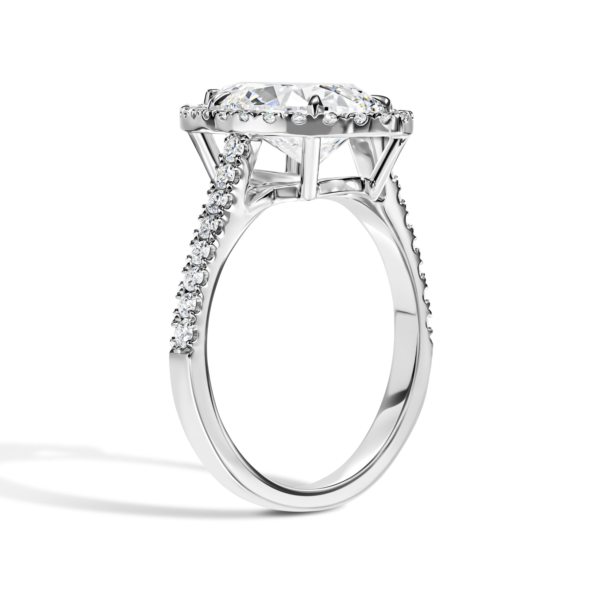 Diamond ring with a large central gemstone and smaller stones on a white background
