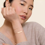 7th female model wearing Five Diamond Bezel Bracelet