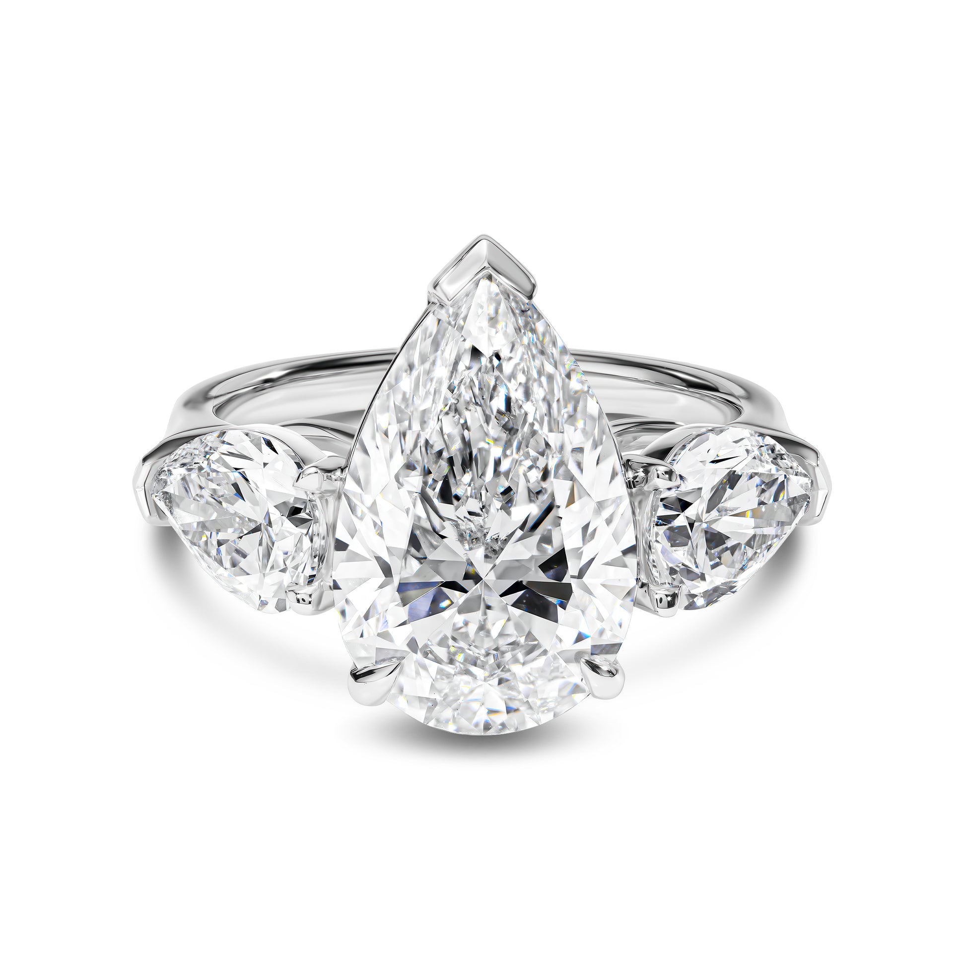 Diamond ring with pear-shaped center stone on a white background