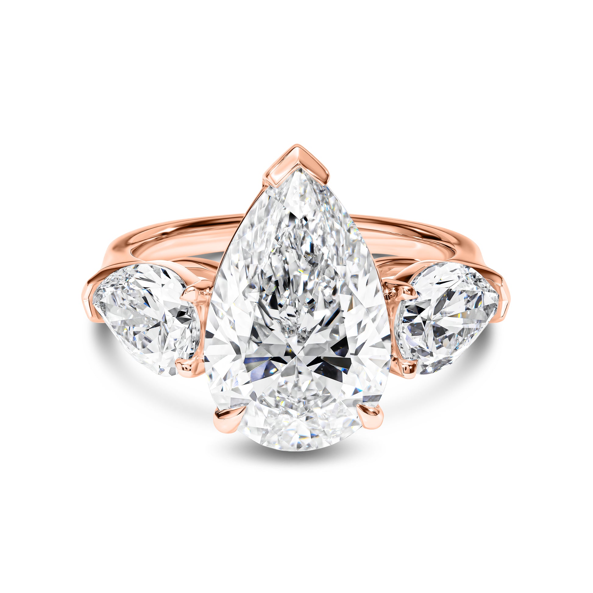 Rose gold ring with pear-shaped diamond on a white background