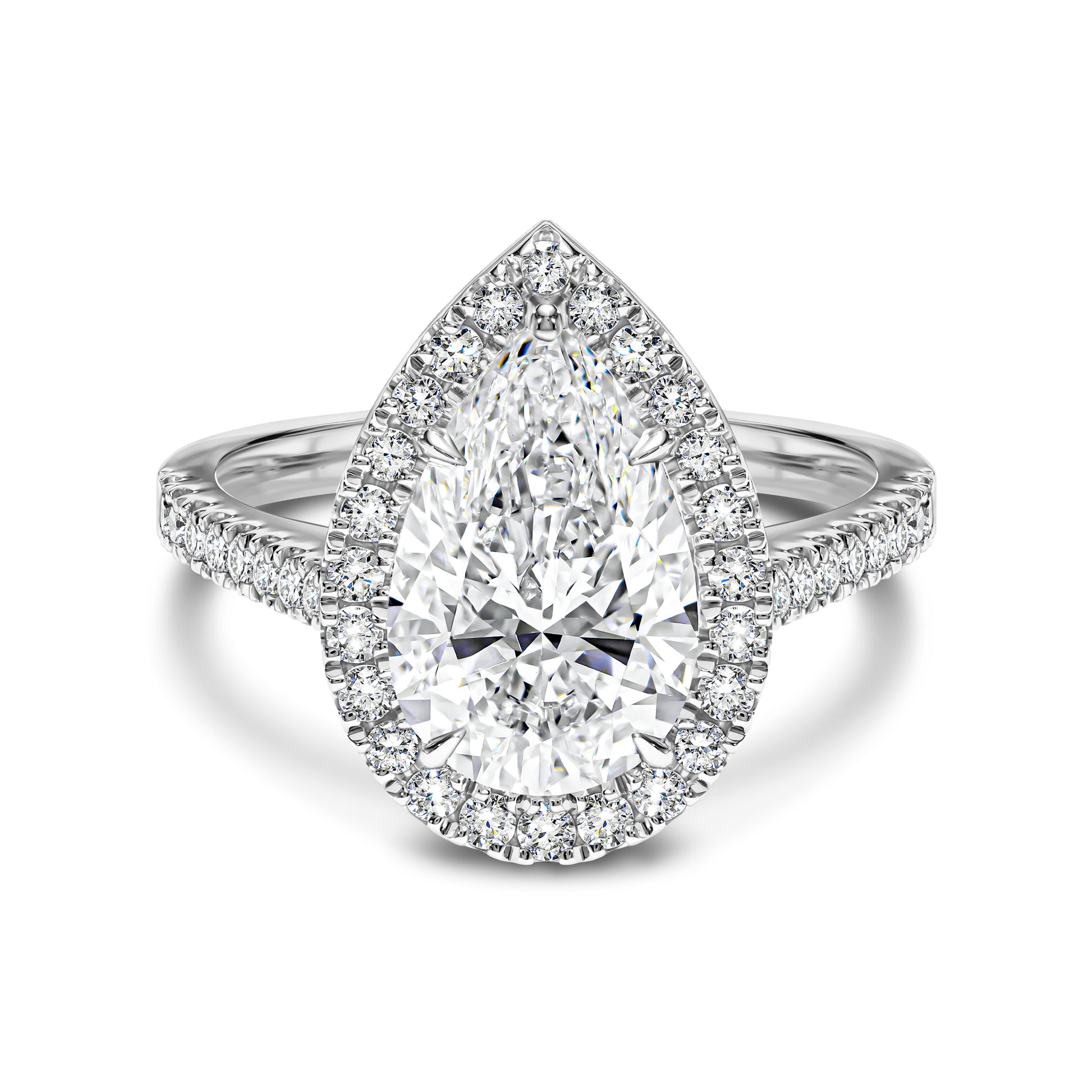 Diamond ring with pear-shaped center stone and halo on a white background